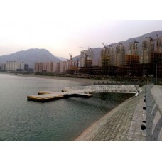 بررسی کارکرد موج‌شکن‌های شناور پانتونی و پی شکل منفرد با یک درجه آزادی